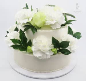 Jay & Kylie Robo Hotel 18.5.25 - Timeless White Floral Vanilla Cake